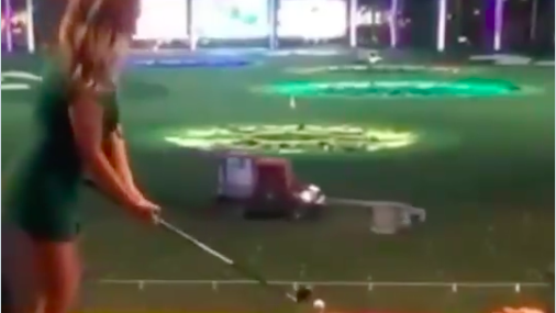 WATCH: Brave couple take on driving range challenge with PAINFUL ENDING